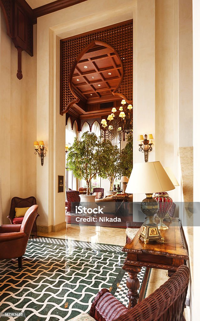 Arabic Lounge View of a large living room with sofa, armchairs arranged in a living room of a hotel in Dubai, arabian style Hotel Stock Photo