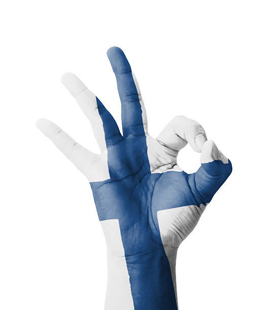 Hand making Ok sign, Finland flag painted stock photo