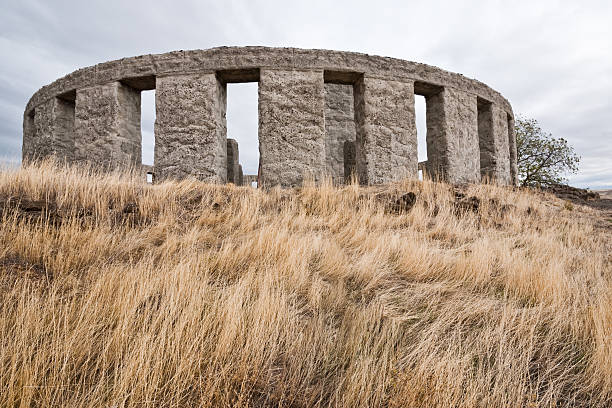 Stonehenge Memorial The Maryhill Stonehenge is a replica of England's Stonehenge. It was commissioned in the early 20th century by the wealthy railroad executive and entrepreneur Sam Hill who was also a Quaker pacifist. The memorial was dedicated on July 4, 1918 to the people who died in World War I. The Maryhill Stonehenge is located near Maryhill, Washington State, USA. jeff goulden columbia gorge stock pictures, royalty-free photos & images