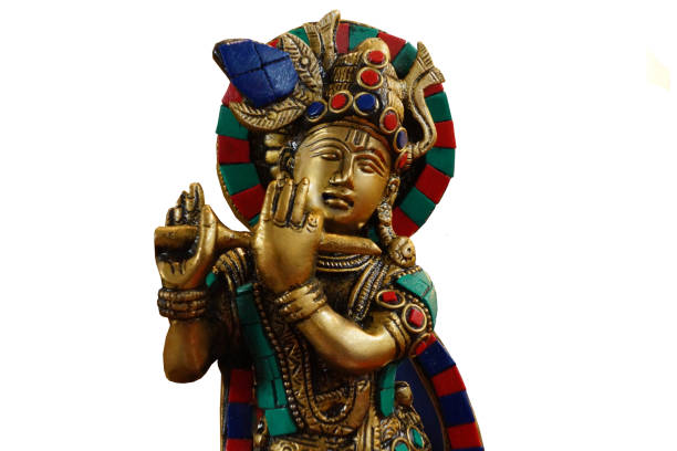 istock Indian god Krishna idol playing bansuri or wind blowing musica instrument 1871839783