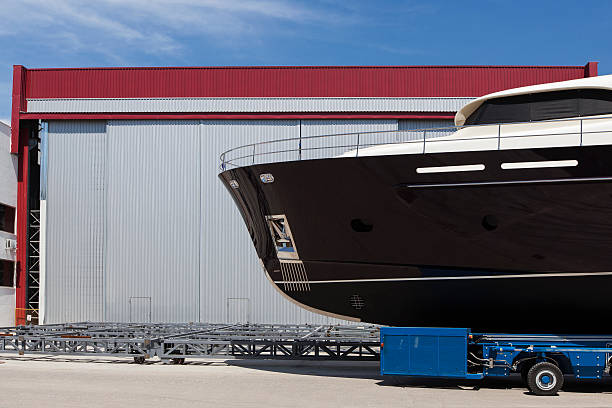 istock New yacht transporting on the asphalt 187184041