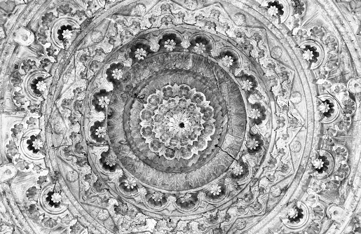 Close-up view of marble carving architectural details of a Indian Jain temple cieling