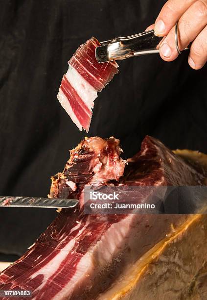 Chef Posing Cutting Cured Ham Stock Photo - Download Image Now - Serrano Ham, Cutting, 40-49 Years