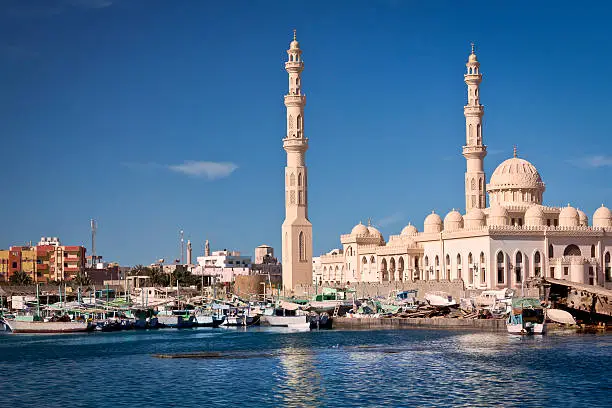 Old Arabian Marina and a new Mosque in background, Hurghada, Egypt