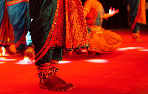 Close-up view of Indian women perform traditional bharatanatyam dance