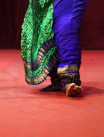 Close-up view of Indian woman perform traditional bharatanatyam dance