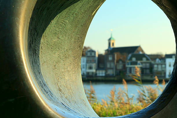 Stone tube Abstract view of Dordrecht across the river looking through a stone tube dordrecht stock pictures, royalty-free photos & images