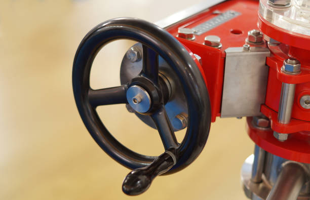 View of circular wheel handle control mechanism of a motor in an industry