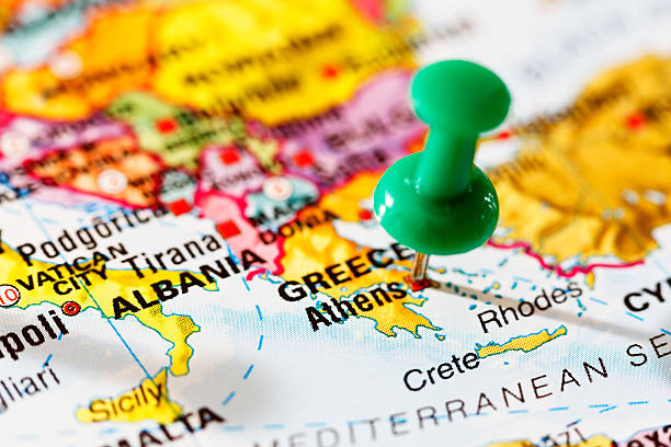 istock Green pushpin marks Athens, capital of Greece, on map 187185869