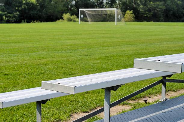 Soccer Field Bleachers and soccer goal on a sunny day. Nikon D300 (RAW) michigan football stock pictures, royalty-free photos & images
