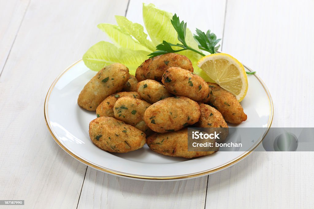 Salt cod fritters and croquettes cod dumplings, cod pasteis,bacalao bunuelos Fritter Stock Photo