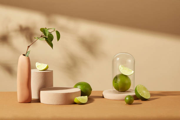 istock Fresh lemons and platforms of different sizes on a brown-beige background. Empty space for product display. Copy space for natural cosmetics advertising 1871883204