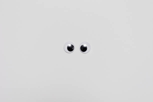 istock Pair of googly eyes on a white background 1871903634