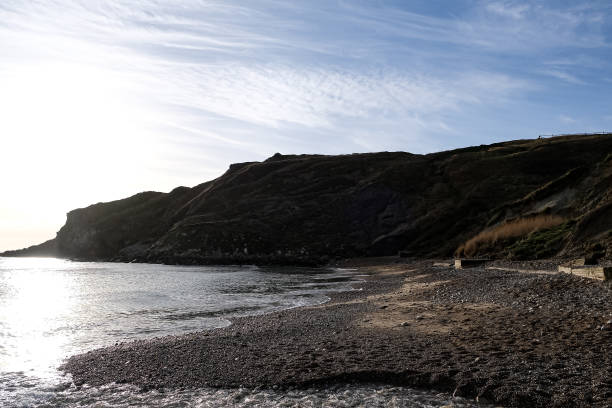 istock Lulworth Cove and beach view at winter day 1871936657