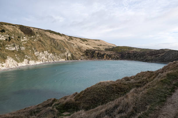 istock Lulworth Cove and beach view at winter day 1871938774