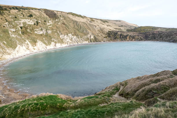 istock Lulworth Cove and beach view at winter day 1871938779