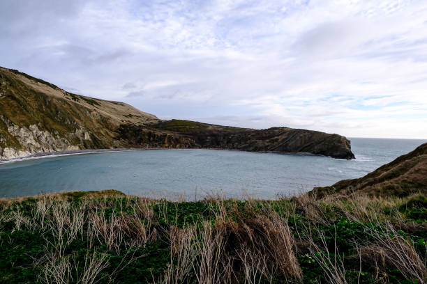 istock Lulworth Cove and beach view at winter day 1871939290