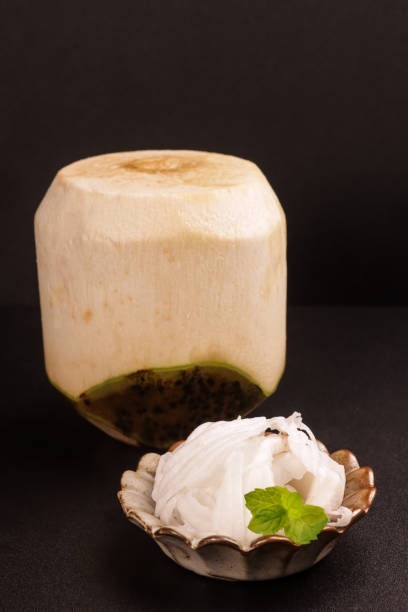 istock Slice of Young Coconut Meat with Young Coconut. 1871955404