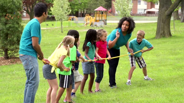 Kids and Camp Counselors Tug Of War