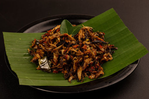 Cakalang Fufu Rabe Rica is Minahasan Traditional Food Made From Shredded Smoked Cakalang (Skipjack Tuna) with Crushed Red Chili Pepper.