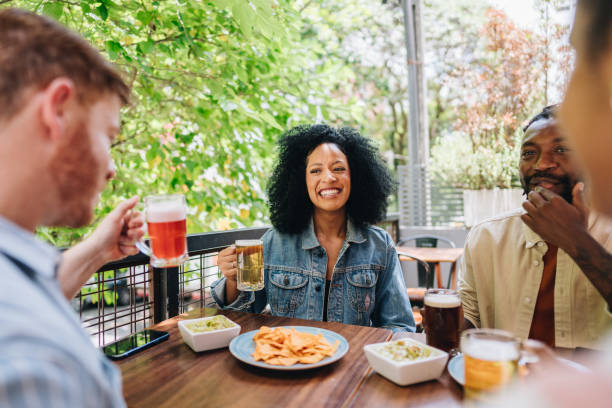 istock Friends talking at bar or restaurant 1872003916