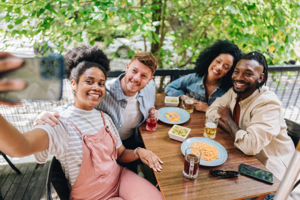 istock Friends taking a selfie at bar or restaurant 1872004421