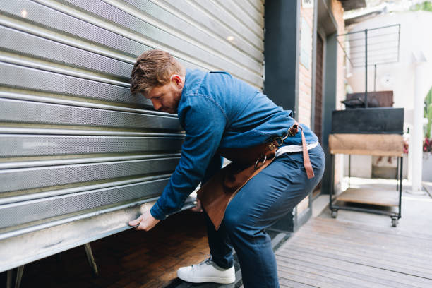 Owner man opening or closing his store