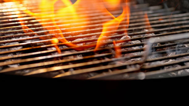 istock Charcoal burning in barbecue grill 1872009647
