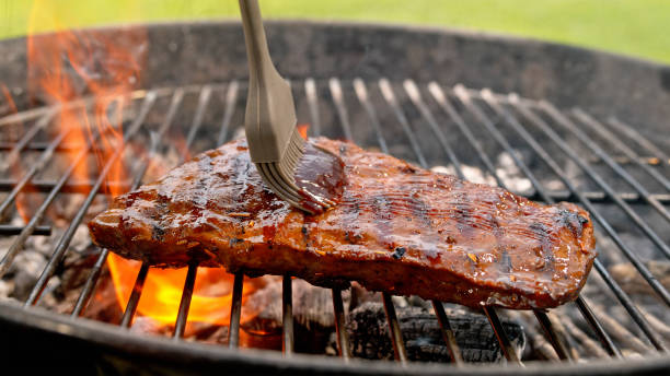 istock Barbecue sauce on roasted meat 1872009661