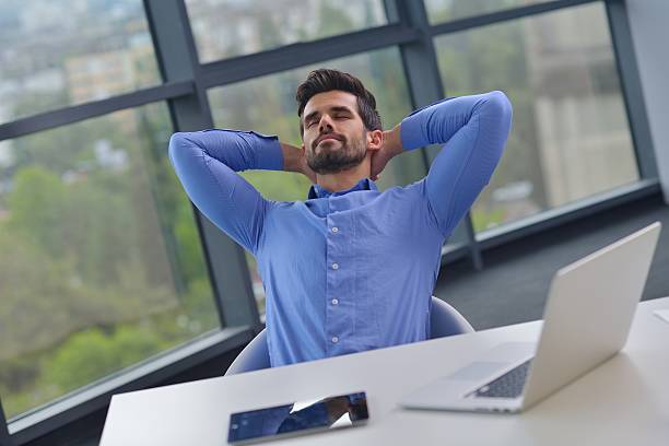 istock happy young business man at office 187201156