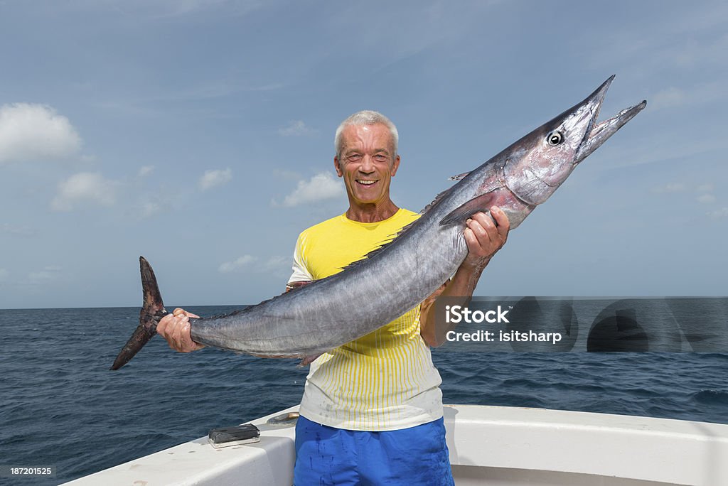 Deep Sea Fishing Deep Sea Fishing off Barbados in the Caribbean. 60-64 Years Stock Photo