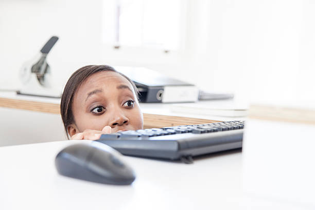 African Businesswomen looking out for her boss stock photo