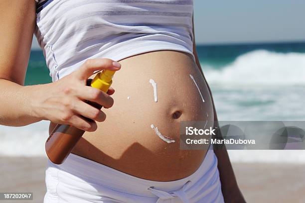 Sun Care Protection For Pregnant Woman Stock Photo - Download Image Now - Pregnant, Sun, Abdomen