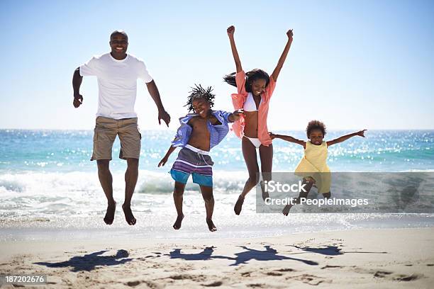 Woohoo Vacation Time Rocks Stock Photo - Download Image Now - Family, Beach, African Ethnicity