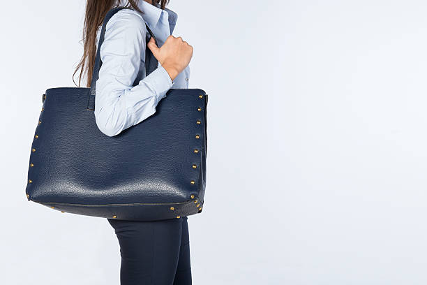 istock Woman Carrying a Shoulder Bag 187203933
