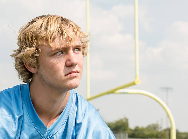 istock Young football player with goalpost 187203993
