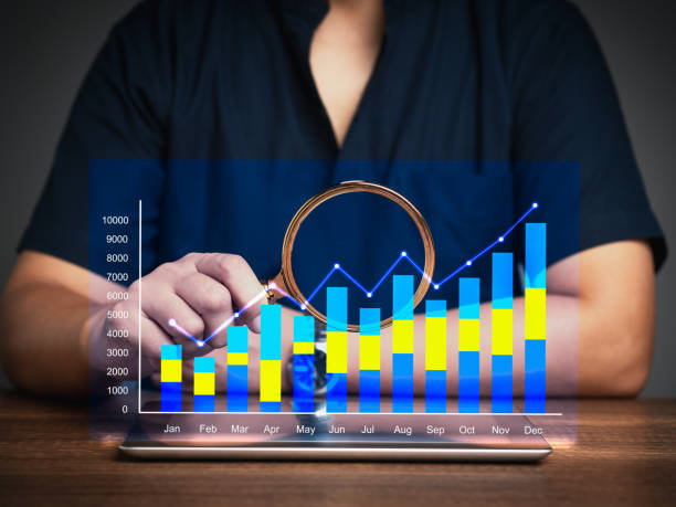 istock Businessman plans business growth in the future on a virtual screen while sitting at the table. 1872048782