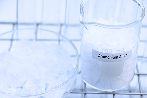 Ammonium Alum in chemical container , chemical in the laboratory and industry, Raw materials used in production or analysis