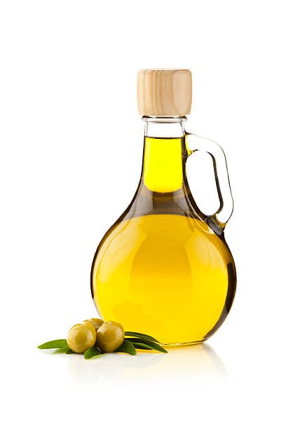 istock Olive oil contained in an round shaped bottle 187205776