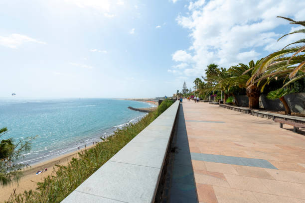 istock Coastline walkway in Maspalomas, Gran Canaria 1872069459