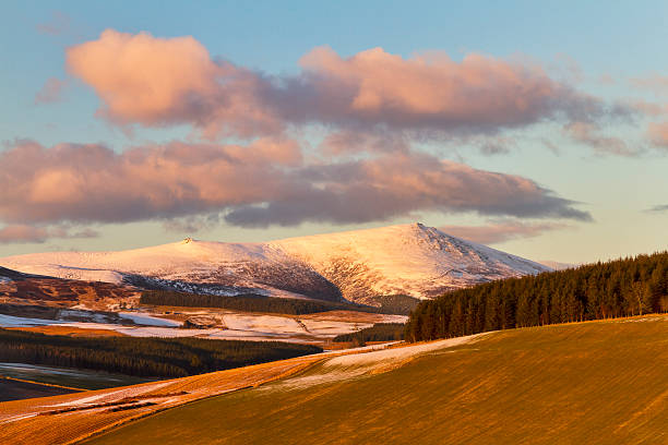 Ben Rinnes in winter. This is the highest point in the Moray area of Scotland. This is Ben Rinnes and the view is on a very cold frosty winters afternoon. moray firth stock pictures, royalty-free photos & images