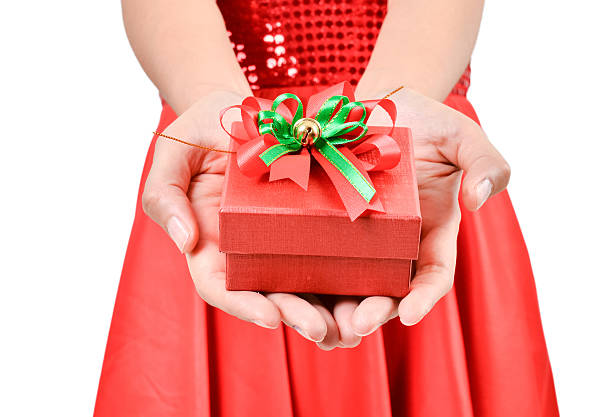 istock Santa woman  holding a gift box 187209372