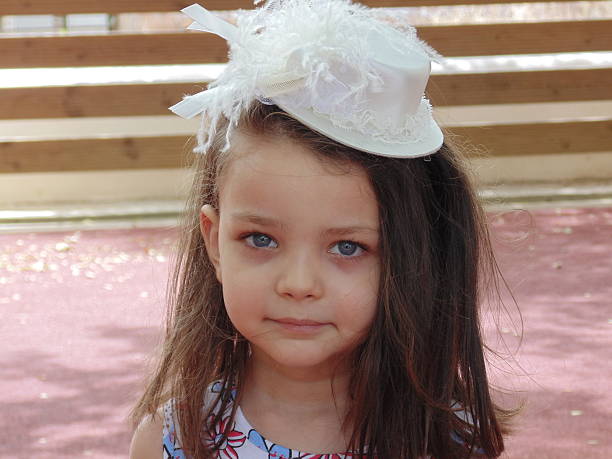 istock Little girl with white hat. 187210406