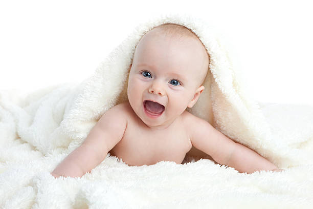 istock Baby Playing in Soft Blanket Isolated on White Background 187212566