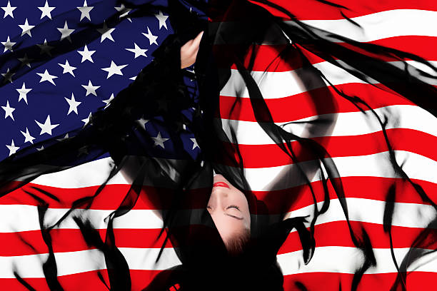 istock Young girl with American flag 187213641