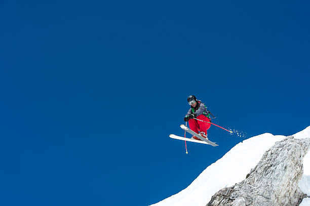 istock Free Ride Skier Jumping 187213925