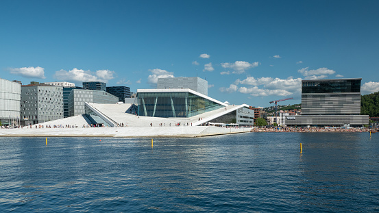 Oslo, Norway - September 24, 2021: Oslo Opera House (Operahuset) at sunrise. Home of Norwegian National Opera and Ballet.