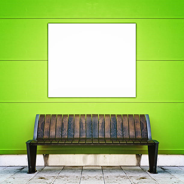 istock Stylish bench against green wall 187217879