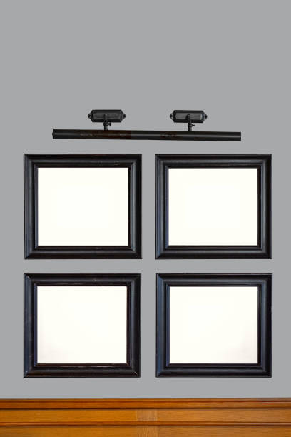 istock Template with four frames for a painting or photograph on gray wall, copy space, vertical 1872214744