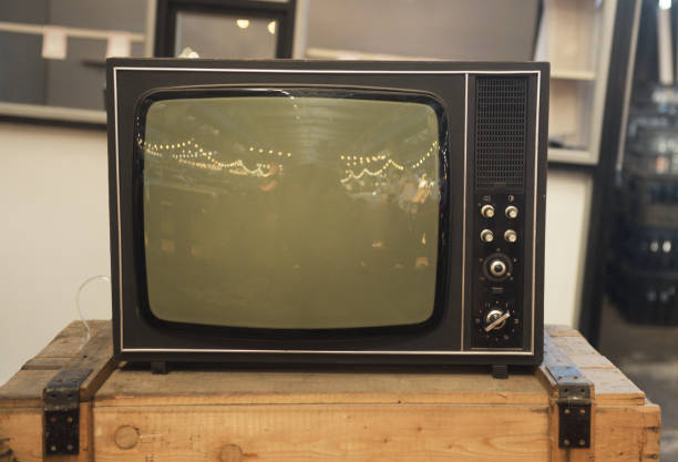 istock An old TV sits on a box. Retro technology concept. 1872220201